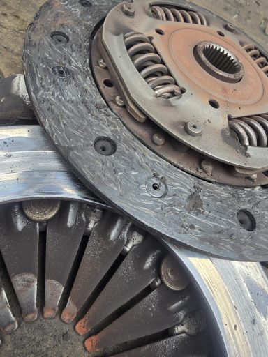 Worn clutch plate for VW Polo showing all the friction material gone
