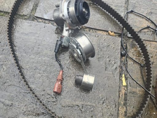 Timing Belt Kit for a 2l TDi engine including water pump, tensioners, and idler pulley