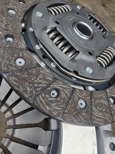 New clutch plate for VW polo showing friction material